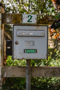 gray metal mail box during daytime
